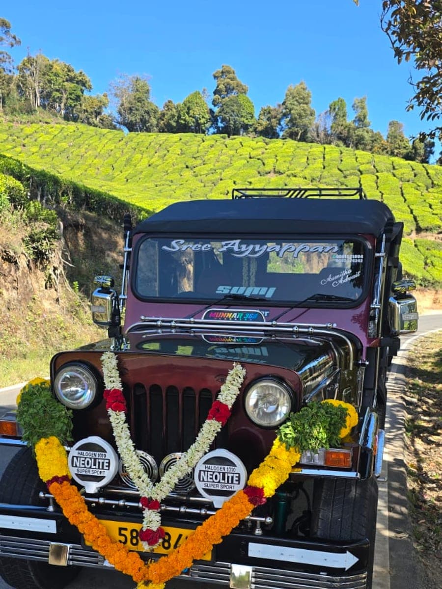 Festival Day, Kerala — Garlanded for the temple festival, as every jeep here is.